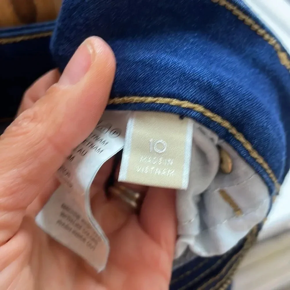 Michael Kors woman’s dark blue jeans. They are a size 10
